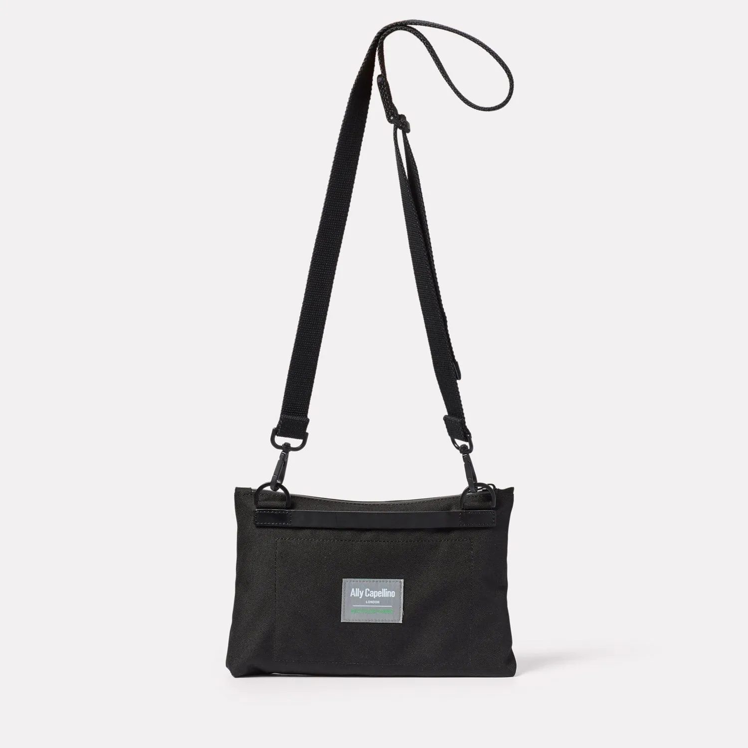 Herb Travel Cycle Crossbody Bag in Black