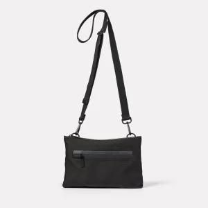 Herb Travel Cycle Crossbody Bag in Black