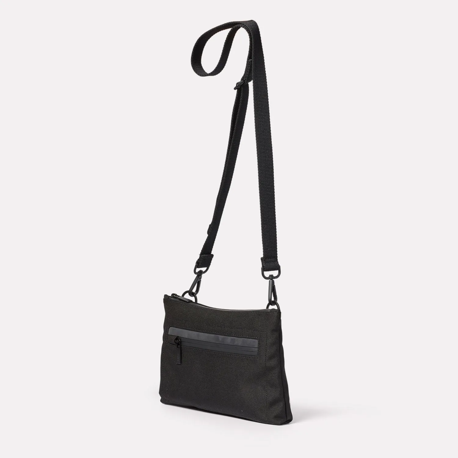 Herb Travel Cycle Crossbody Bag in Black