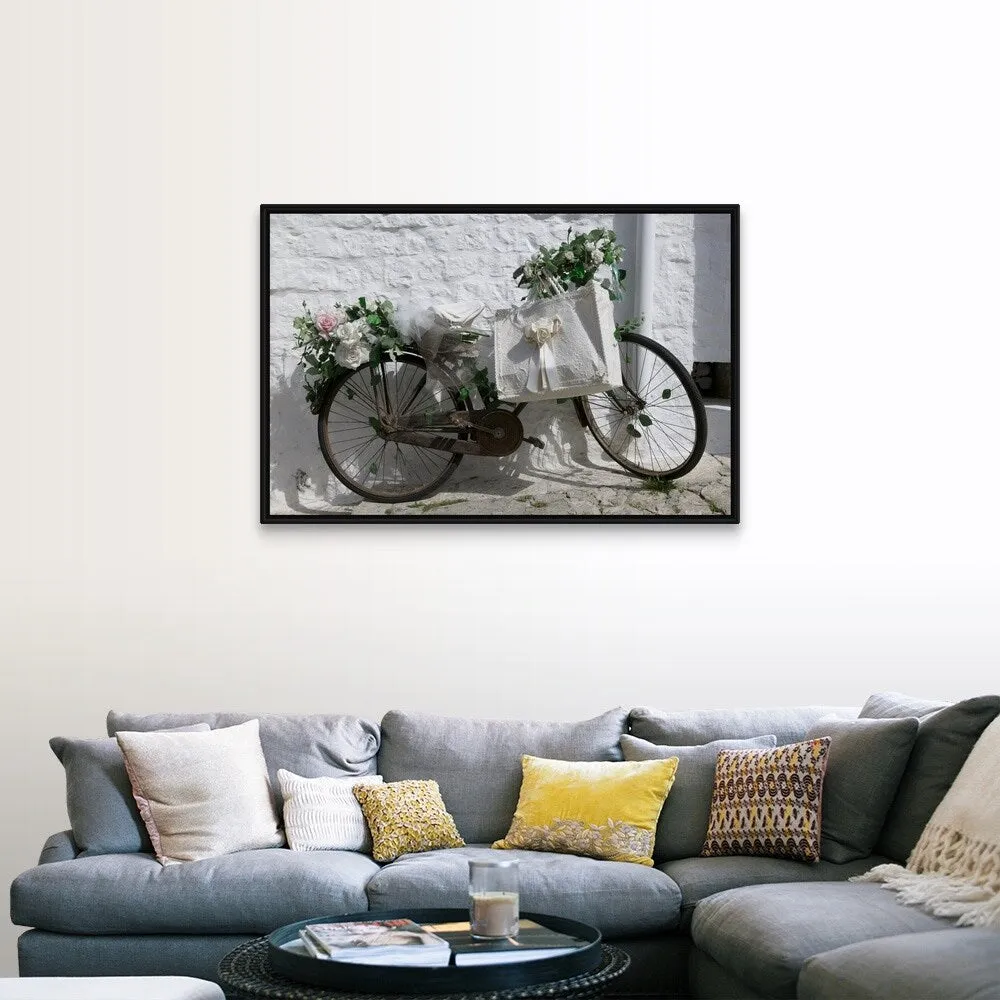 "Bicycle parked against a wall, Trulli House, Alberobello, Apulia, Italy" Black Float Frame Canvas Art