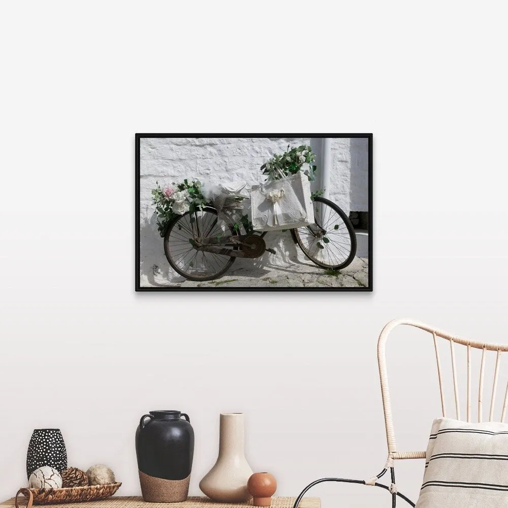 "Bicycle parked against a wall, Trulli House, Alberobello, Apulia, Italy" Black Float Frame Canvas Art