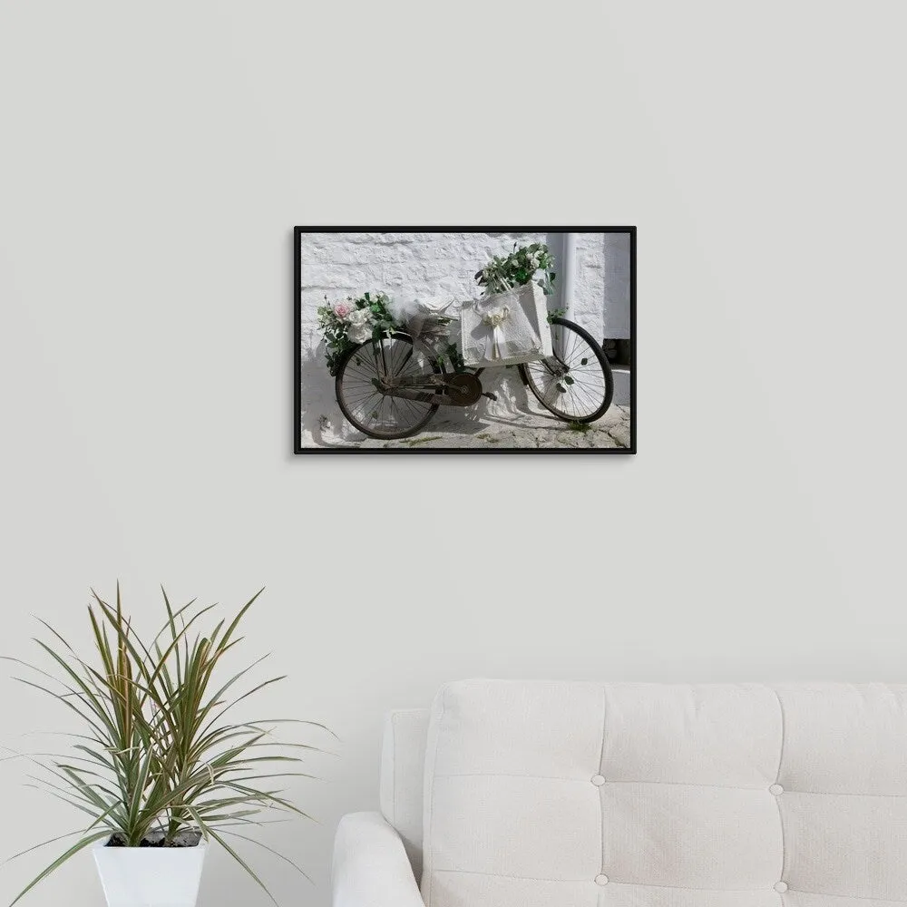 "Bicycle parked against a wall, Trulli House, Alberobello, Apulia, Italy" Black Float Frame Canvas Art