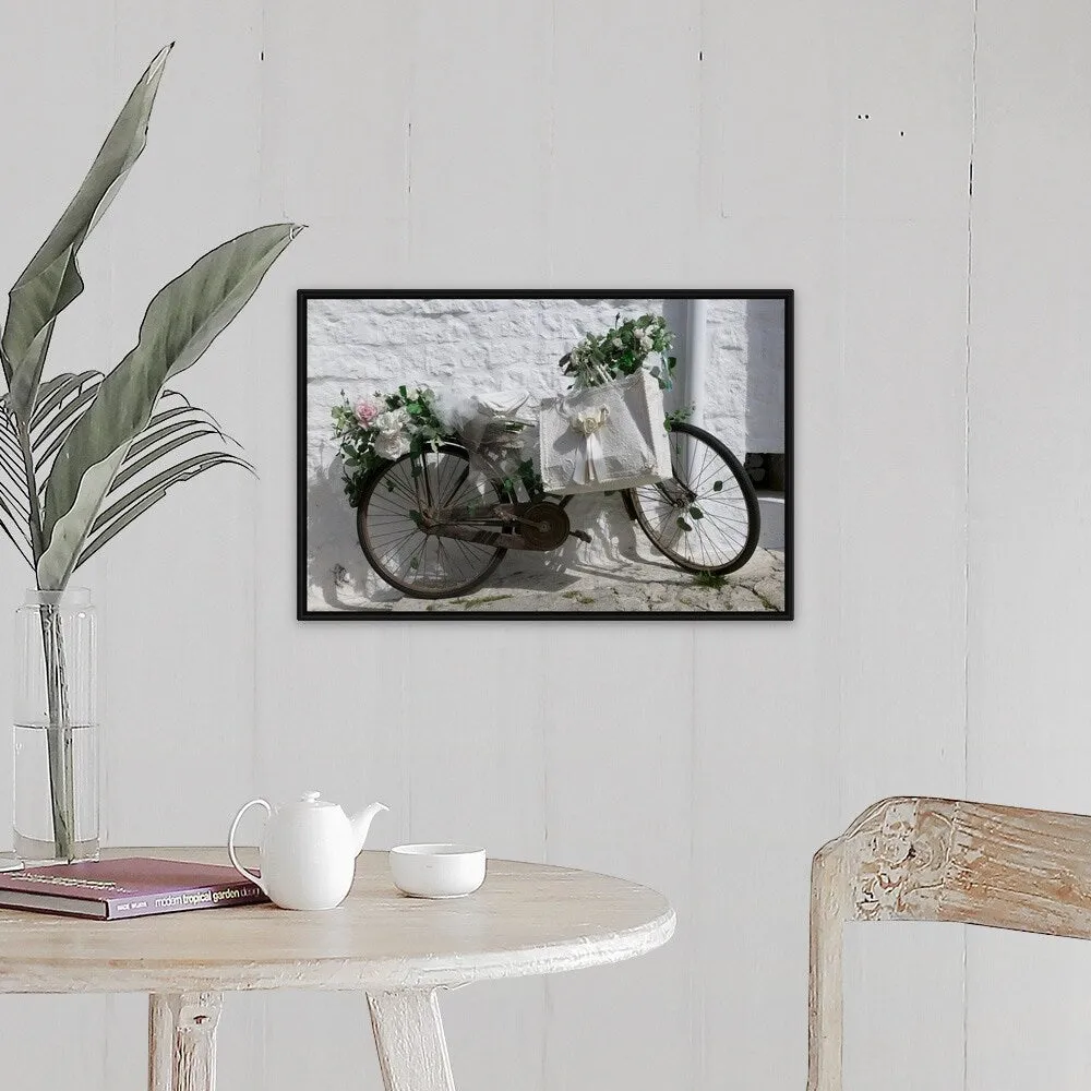 "Bicycle parked against a wall, Trulli House, Alberobello, Apulia, Italy" Black Float Frame Canvas Art